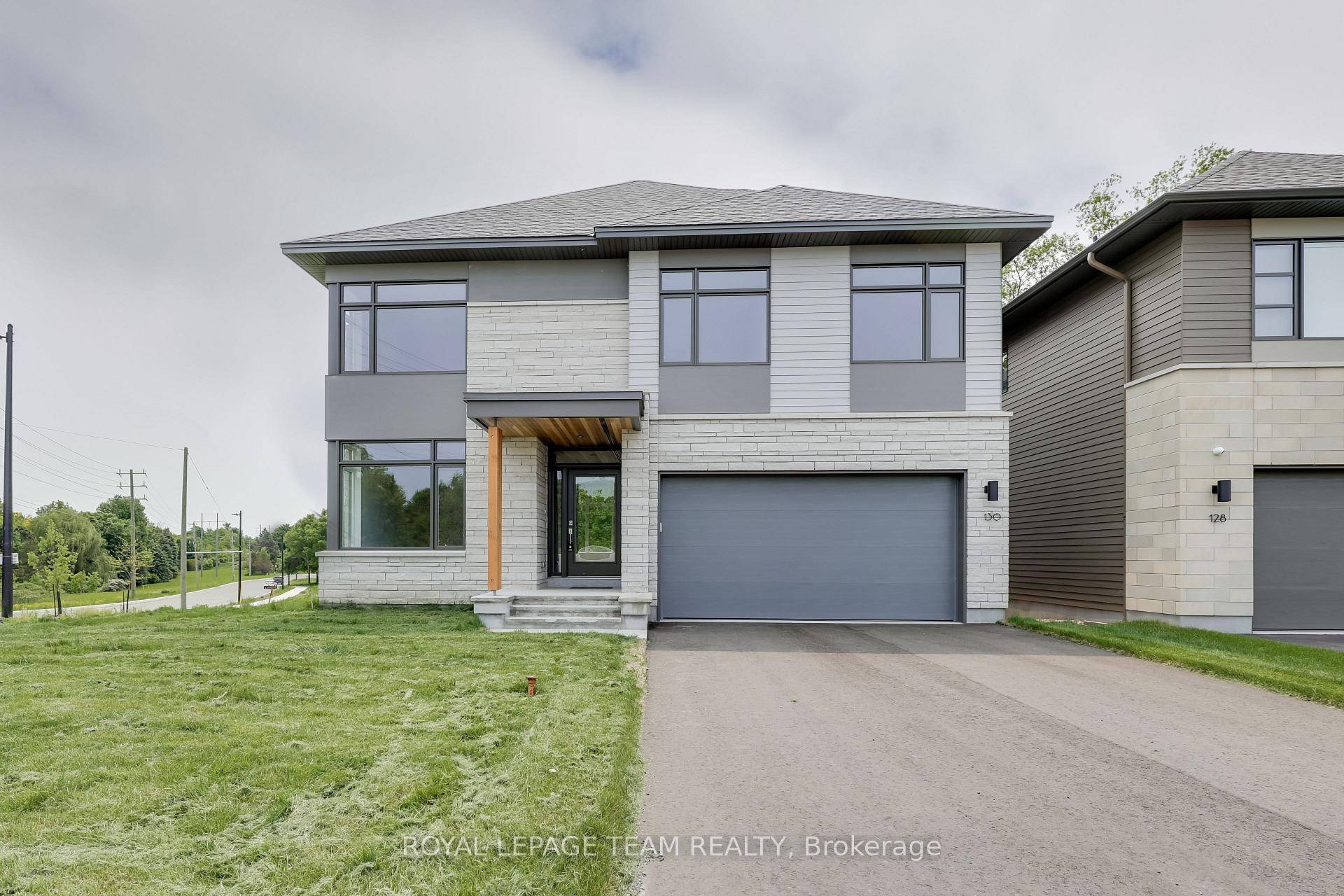 This elegant 1 year old 2 storey detached home with a walk out basement in Kanata Lakes offers the perfect blend of architectural design, modern comfort, and natural beauty.