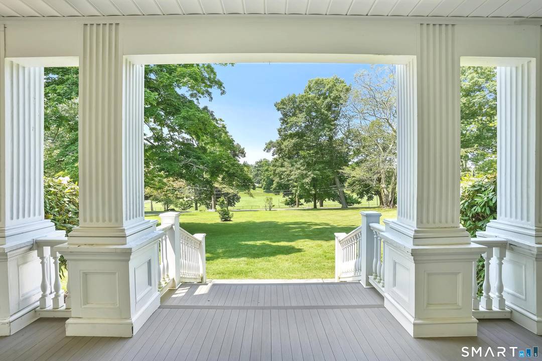 Elegant Georgian Colonial 15 room home in prime location overlooking downtown Ridgefield.