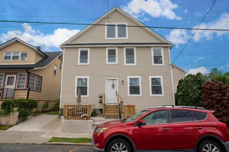 Beautifully remodeled 2 family home Ideal for investment or extended living !
