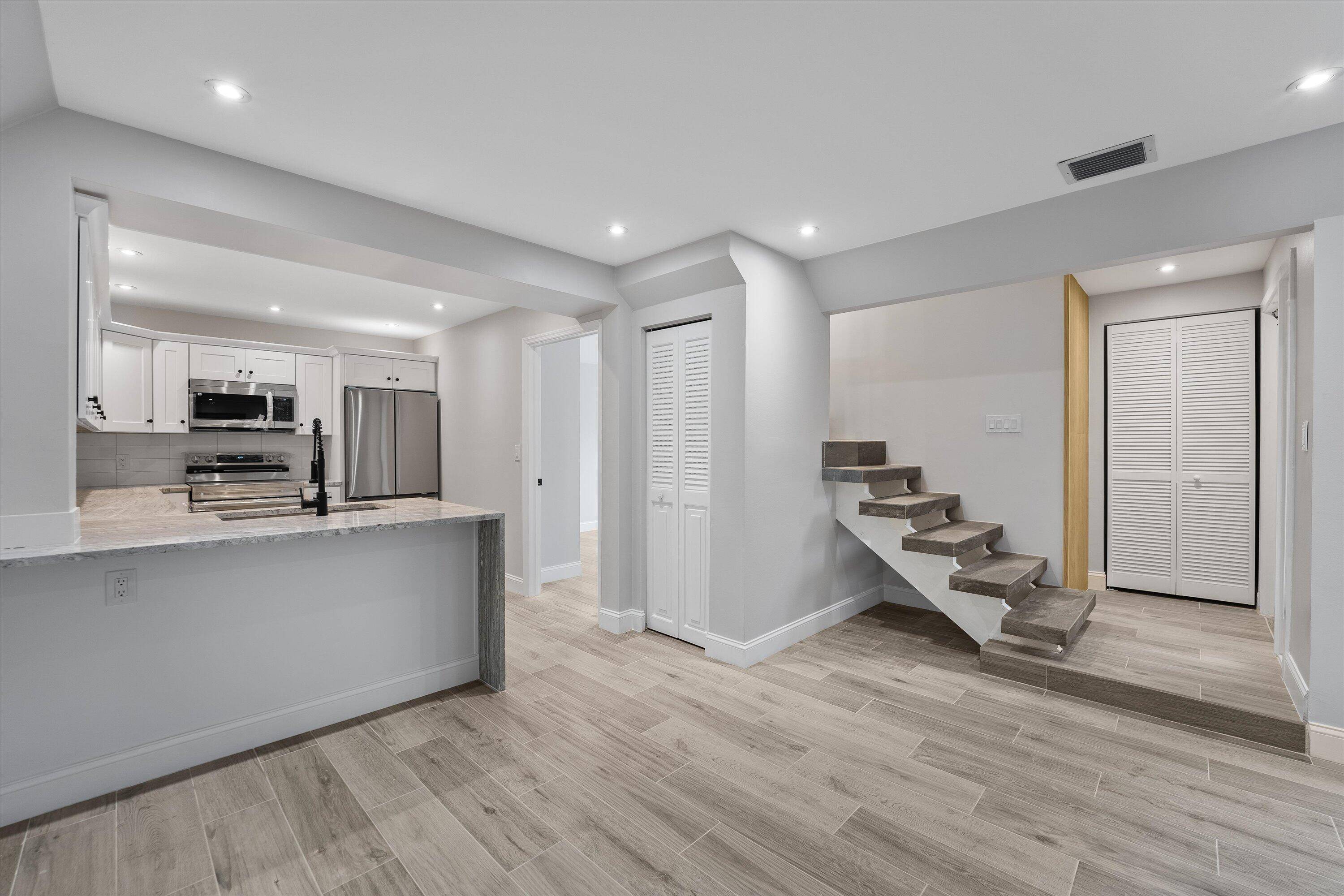 This gorgeous, completely renovated 3 bedroom, 2 bathroom townhouse is a true gem.
