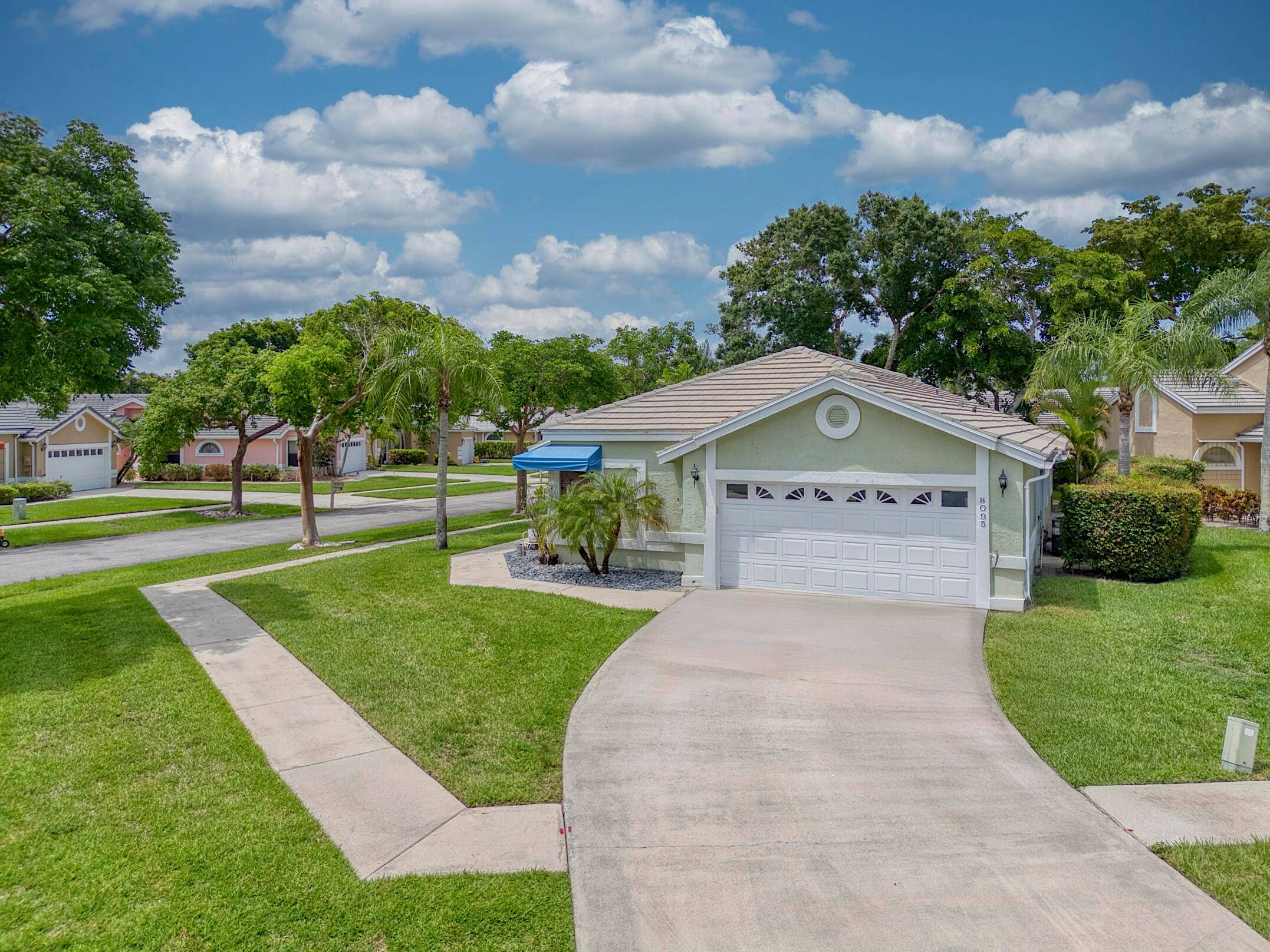 Welcome home to your single story home with double garage on a large corner lot in Atlantic National Lacuna.