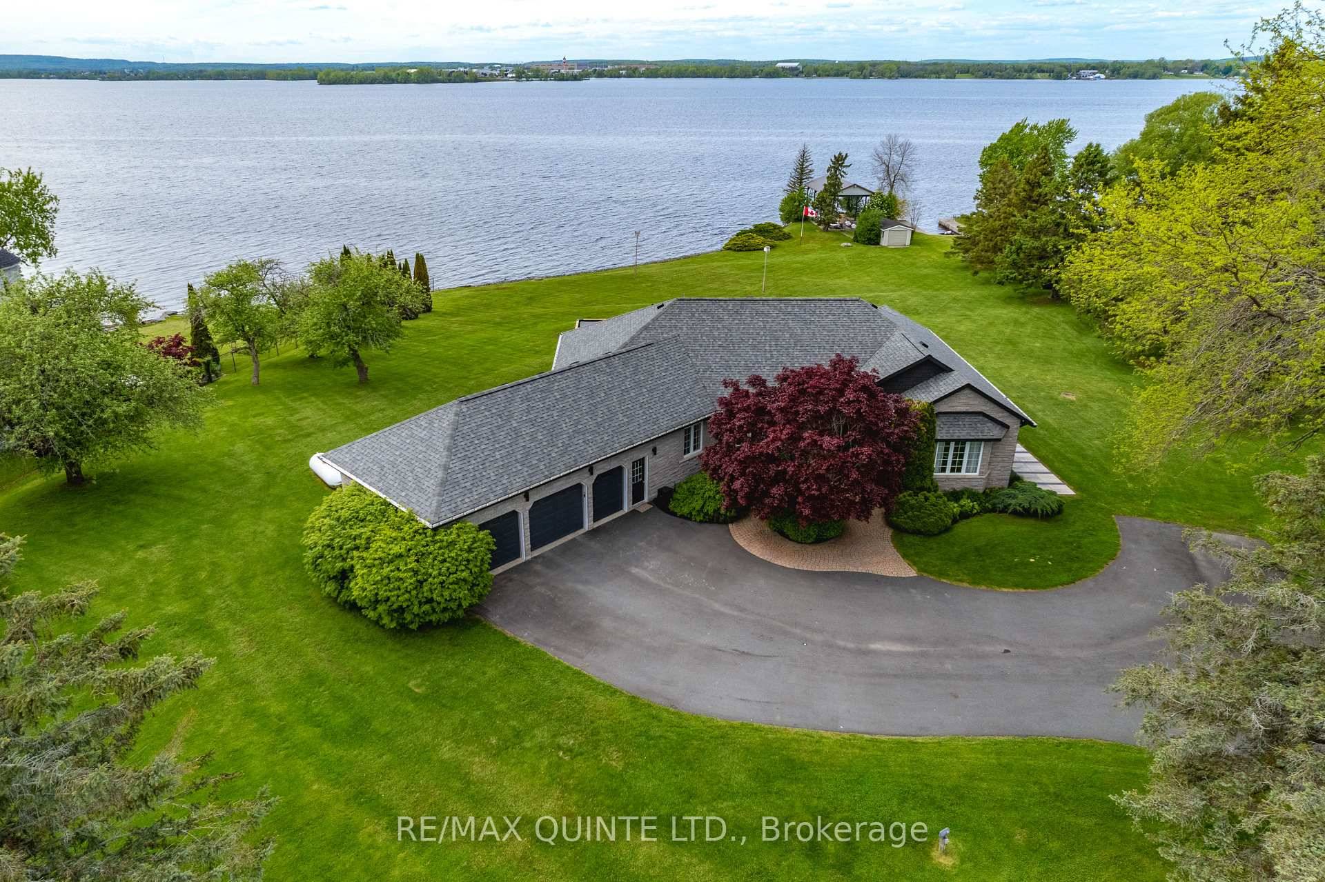 Welcome to a rare offering along the coveted Bay of Quinte shoreline, where timeless sophistication meets the serenity of nature.