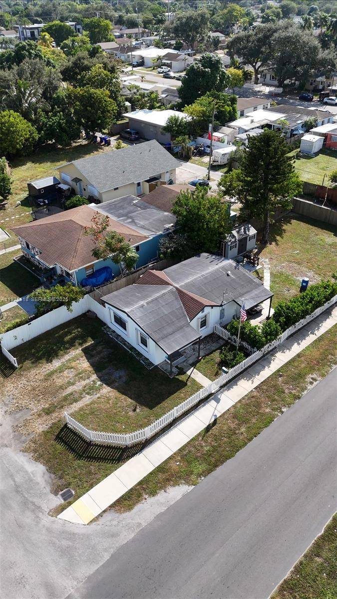 Beautifully remodeled property at 2444 Roosevelt St featuring a brand new modern kitchen with updated cabinetry, countertops, and appliances, along with a fully renovated bathroom showcasing contemporary finishes.