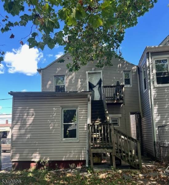 This two unit house has 5 rooms in the first floor apartment, LR, Modern Eat in Kitchen, three bed rooms, bath.