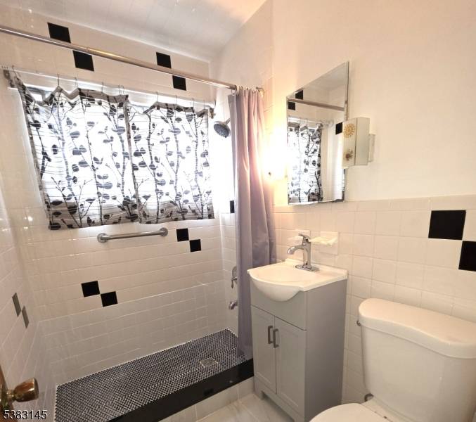 Brand new bathroom ! ! New hot water heater, new basement sump pump system, and a new above ground oil tank.