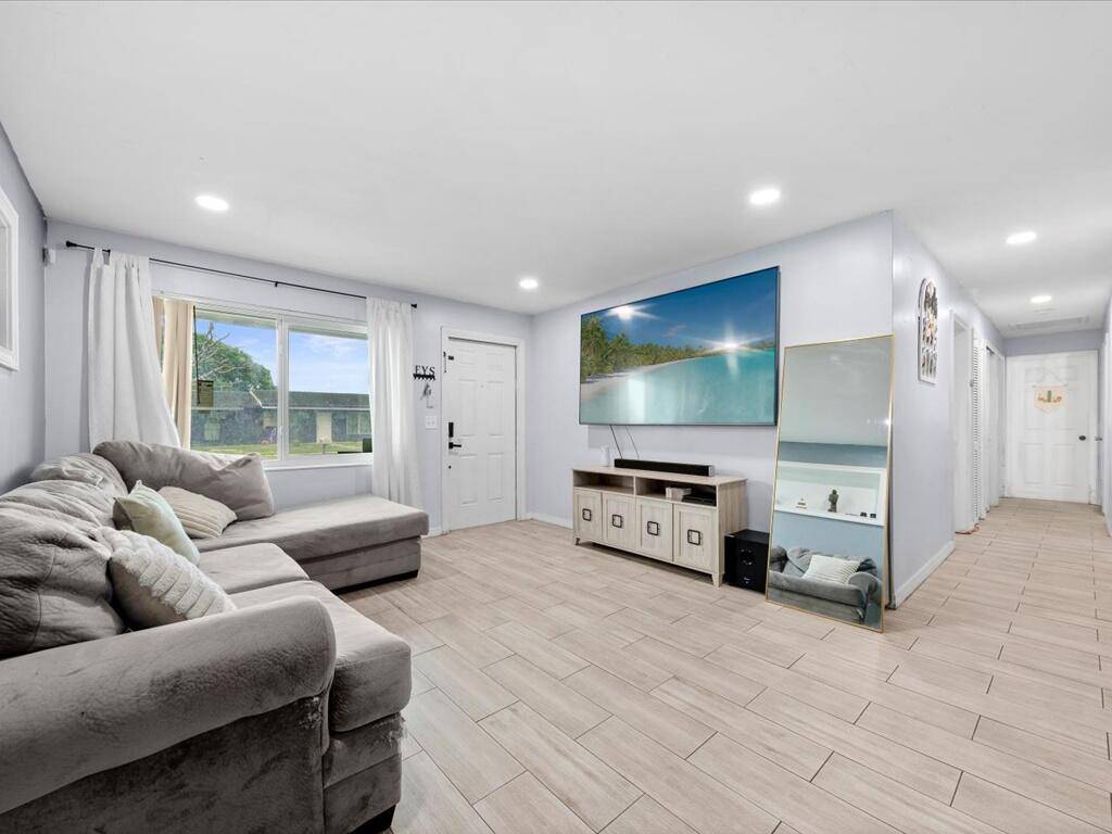 Updated coastal home minutes to Singer Island's beaches, marinas, and waterfront dining.