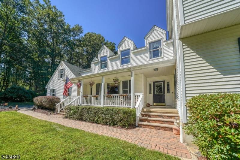 Look no further ! ! Privacy abounds as this home is nestled on over 3.