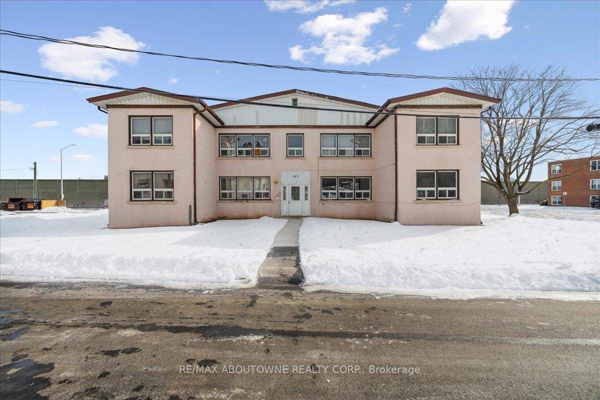 Discover modern living in this recently renovated 2 bedroom, 1 bathroom unit at 145 North Service Road East in Oakville's College Park neighborhood.