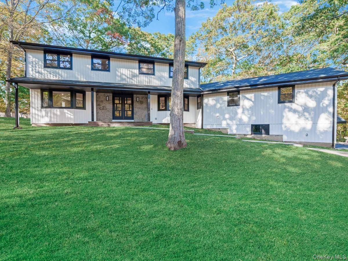 A Serene Retreat in Strathmore at Dix Hills Step into a world of serenity, privacy, and timeless elegance with this stunning modernized colonial perched atop a wooded hill at the ...