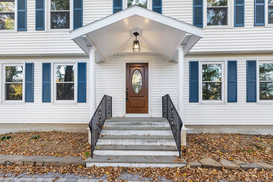 Built to Last ! Welcome to 545 Simsbury Road, a striking and versatile residence set on a private, wooded 3.