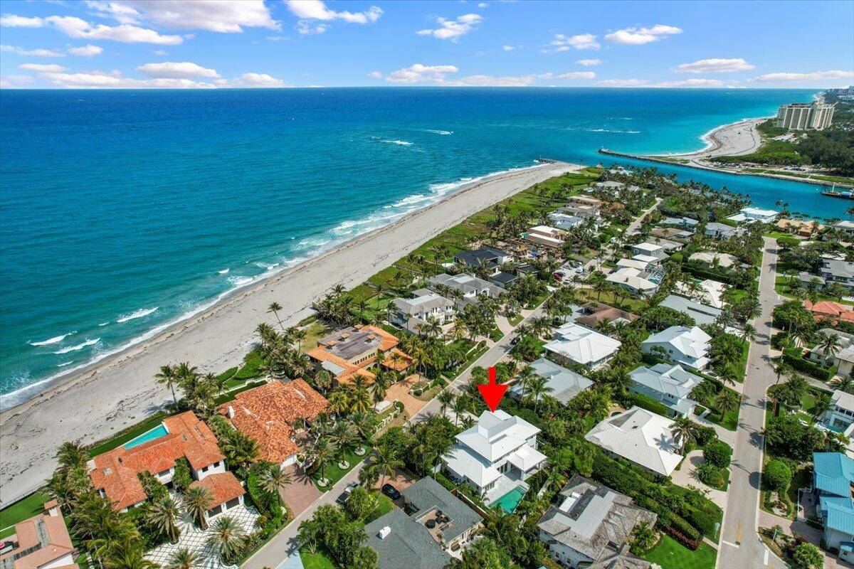 Experience the pinnacle of coastal luxury in this brand new custom home, perfectly positioned in the exclusive Jupiter Inlet Colony on Jupiter Island.