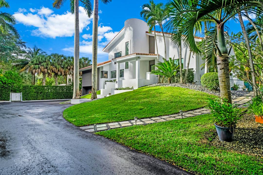 Experience unparalleled luxury and exclusive privacy in the coveted guard gated community of Gables Pinecrest by the Sea.