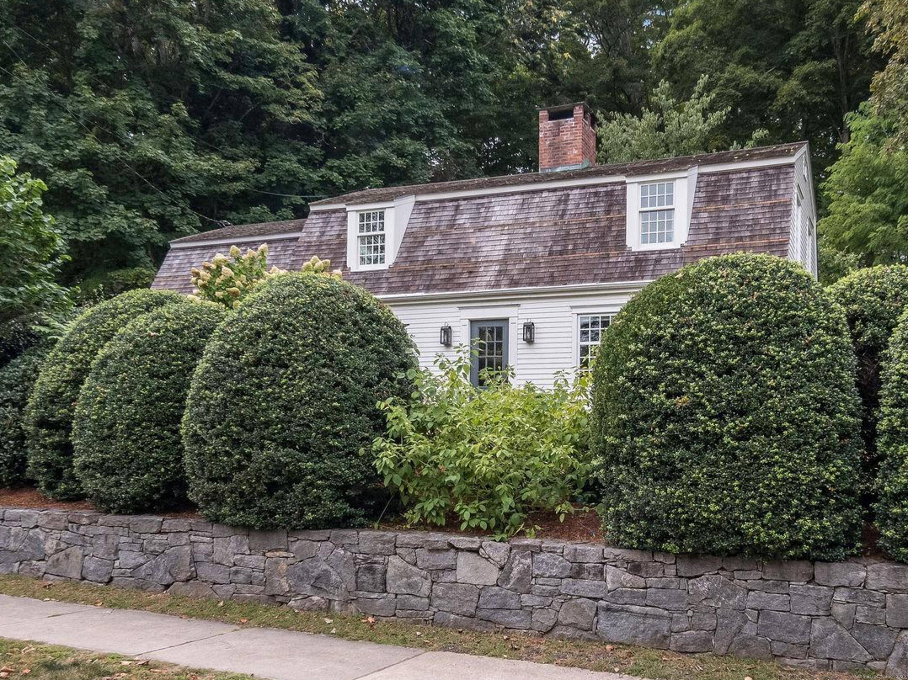 Absolutely Delightful ! Tucked away in the heart of Essex Village you'll find 38 Grove Street, a classical New England styled Antique Colonial.