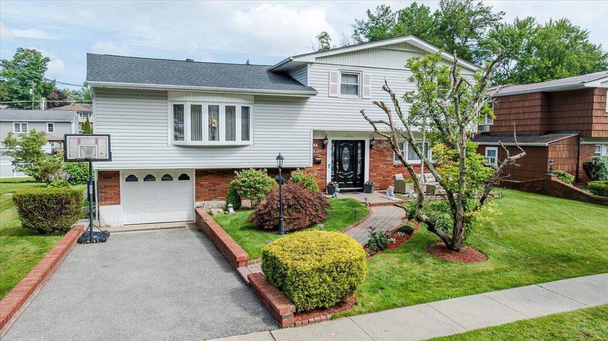 Welcome to 54 Maria Lane, an inviting split level home located in the desirable Yonkers Heights neighborhood, just a stone's throw from the Crestwood train station and Scarsdale Road.