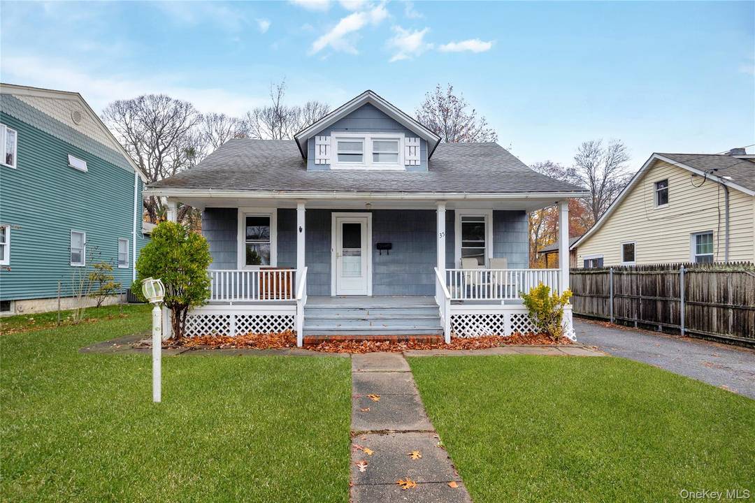 This newly renovated Cape style home in the East Islip School District features three bedrooms and one and a half baths, set on an oversized 50' x 182' property.