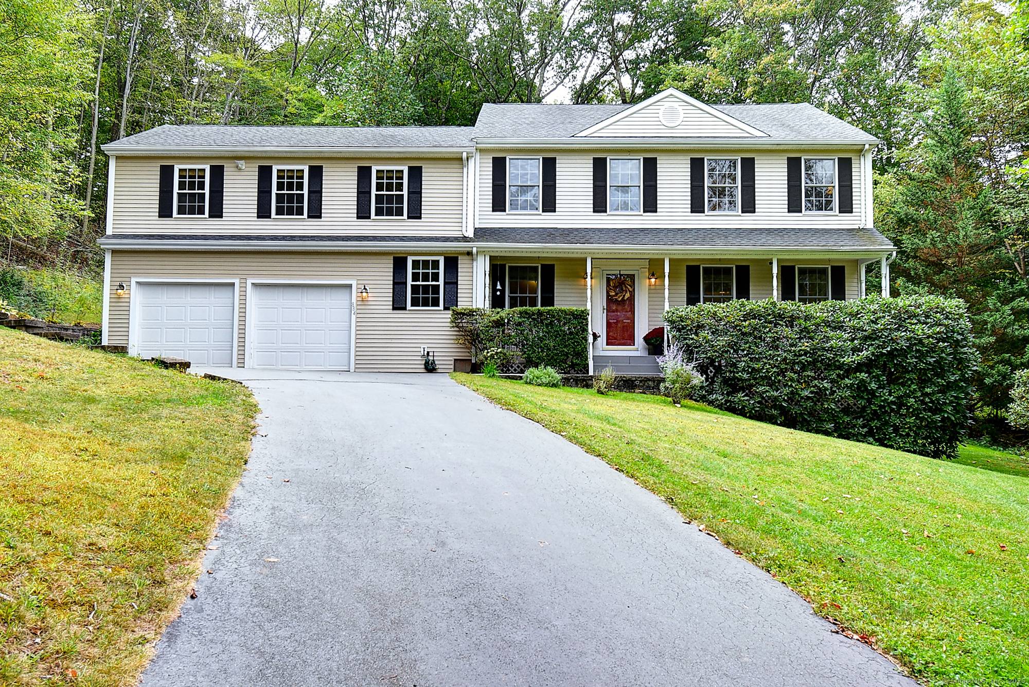 Tucked away on a private, wooded acre lot in beautiful Cheshire, this timeless Colonial home offers over 3, 000 square feet of inviting living space, where comfort and connection are ...