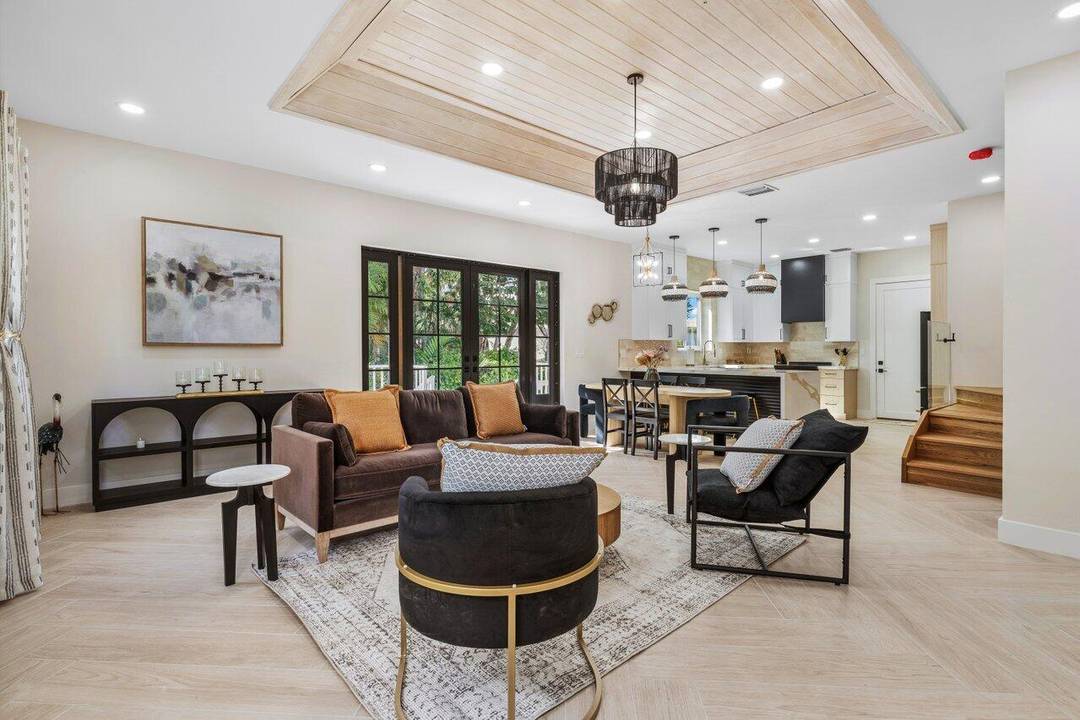 Step into sophistication with this brand new, designer finished townhome just over the bridge from Delray Beach's stunning shoreline.