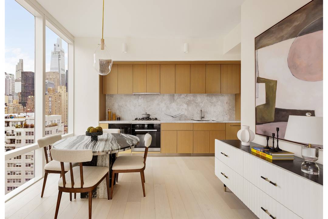 Luxury corner one bedroom home with 10' floor to ceiling windows, and expansive Southern and Manhattan Skyline views.