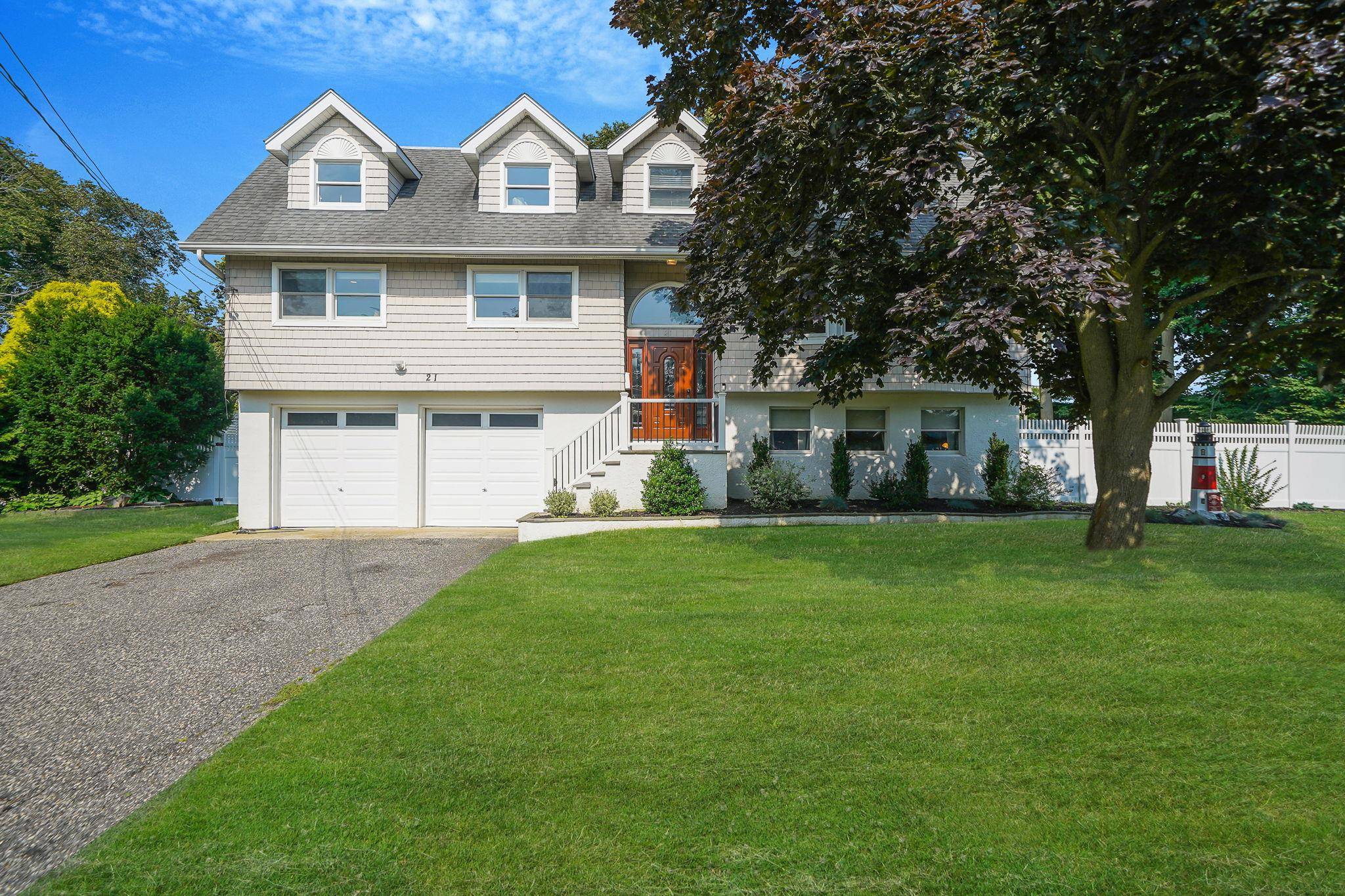 Welcome to 21 Nancy Drive, Sayville a beautifully updated 3, 600 sq.