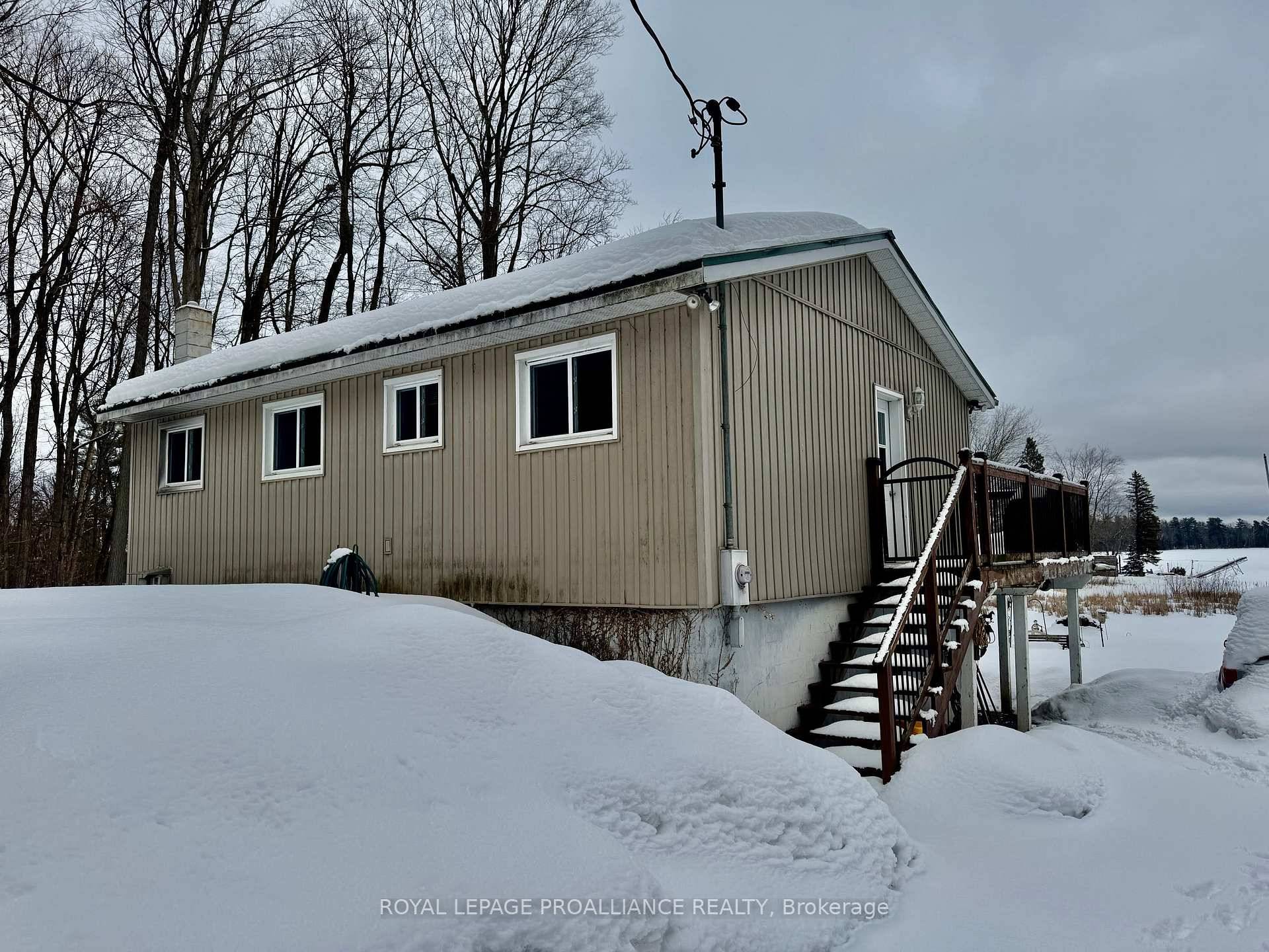Discover the perfect blend of comfort, nature, and lakeside living with this year round raised bungalow on the beautiful shores of Crowe Lake.