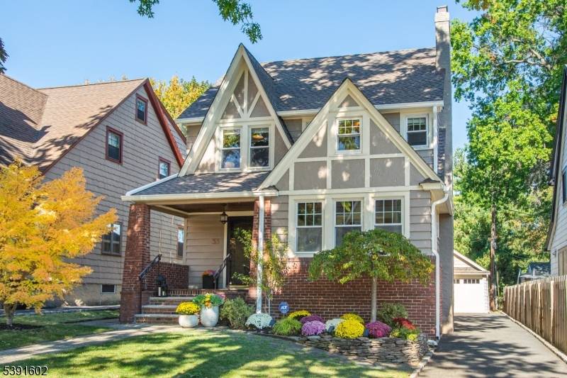 Set on a bucolic, tree lined block just steps from Brookdale Park, this picture perfect 3 bed, 2.