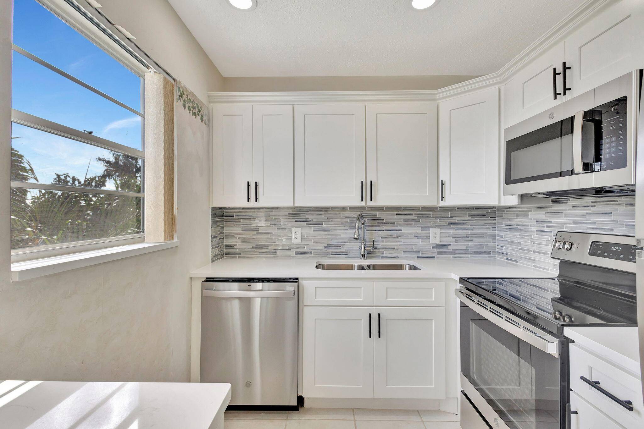DISCOVER ELEGANT LIVING IN THIS STUNNING FURNISHED 2 BED 1 1 2 BATH CORNER UNIT IN CENTURY VILLAGE,.