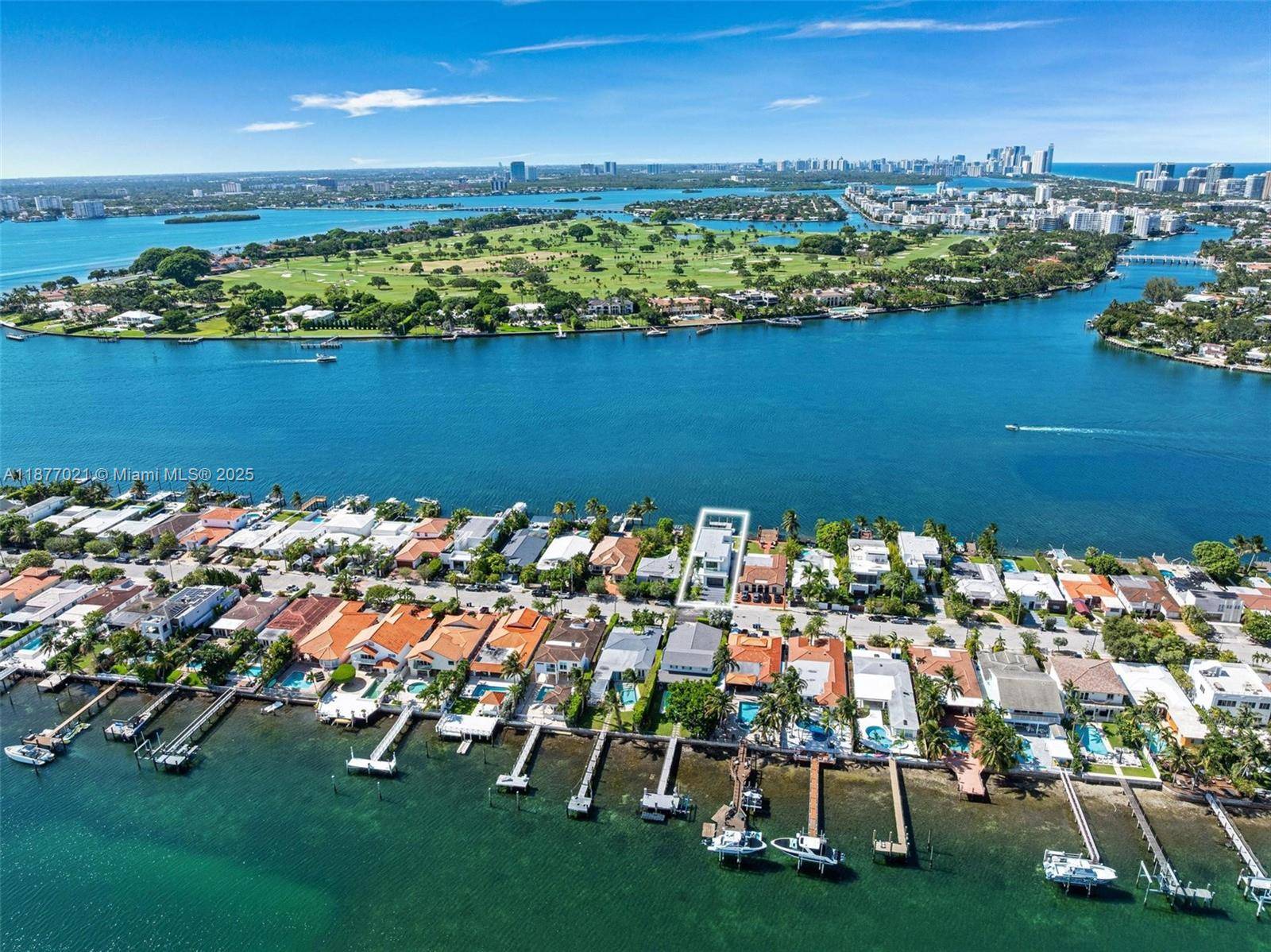 Exceptional new construction waterfront residence in a prestigious gated community with ocean access and bay views.