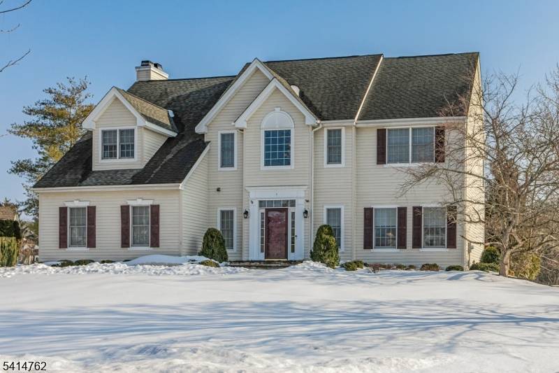 Beautifully set within Cherry Valley Country Club, this refined home welcomes you with a dramatic two story foyer and formal spaces designed for effortless entertaining.