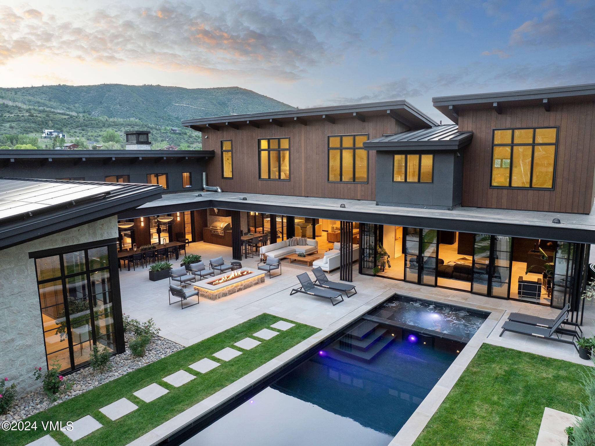 New construction masterpiece in prestigious Lake Creek Valley.