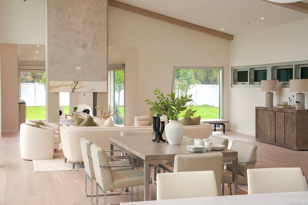 A masterful full renovation by acclaimed Coastal Luxury Homes, this extraordinary modern residence redefines sophistication in the heart of Westport.