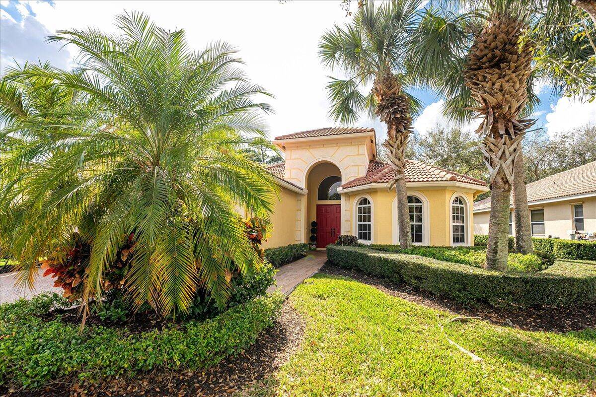 Tee up your Florida lifestyle at 8821 Champions Way in the prestigious PGA Village.