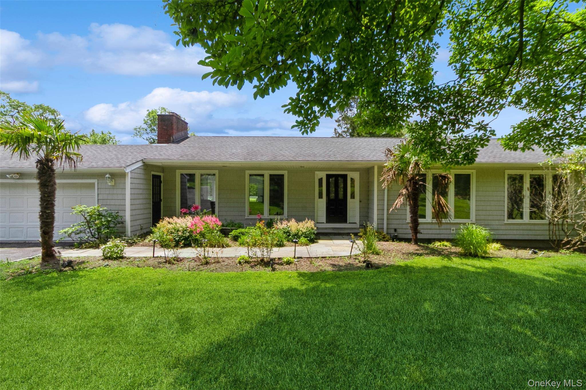 Enjoy vacation like living everyday in this spacious home located on 1 acre of parklike property.