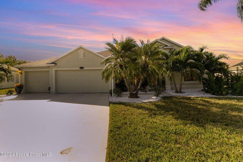 Active 55 Grand Isle Community Estate home featuring new 11'X22' saltwater pool powered by solar tubes, and 3 Car garage !