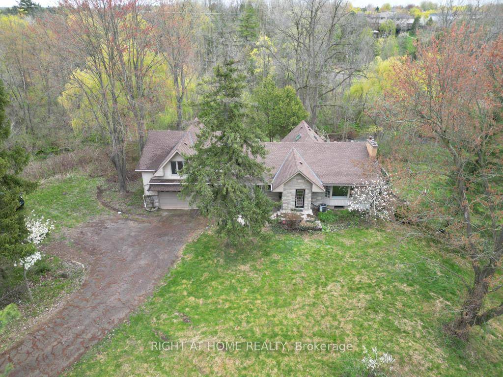 Rare custom built home with recent renovations, situated on nearly 5.