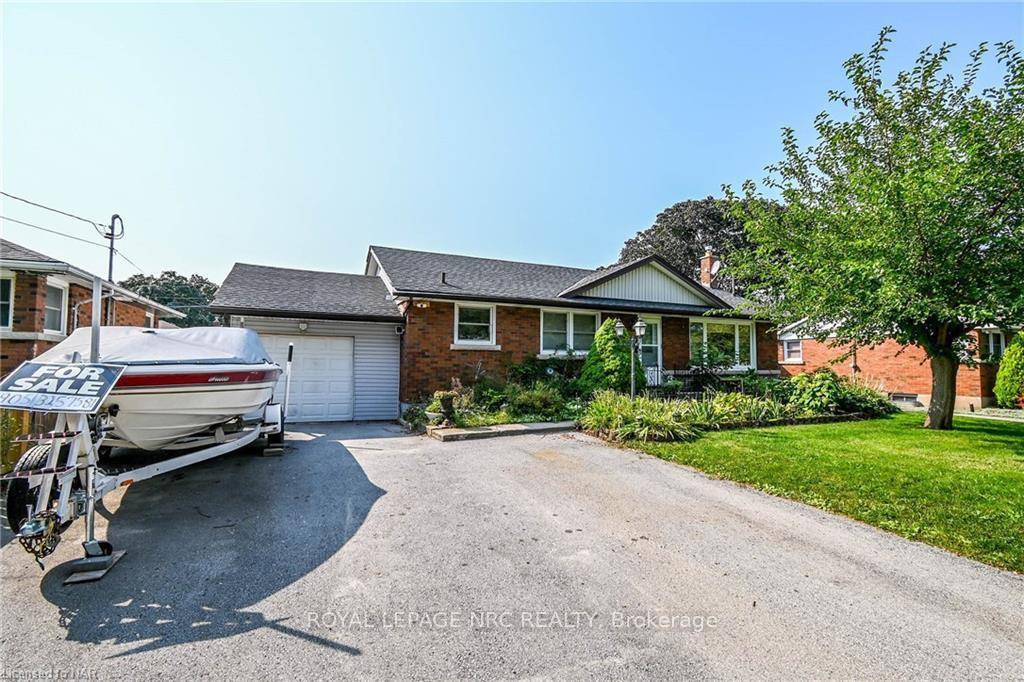 Welcome home to 449 Bunting road, a spacious 3 plus 1 bedroom, 2 bathroom brick bungalow situated in the highly desired north end of St.