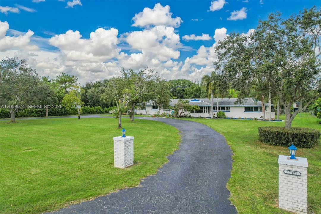 With 4 bedrooms, 3 bathrooms, and an Additional Room Den Office on over 1.