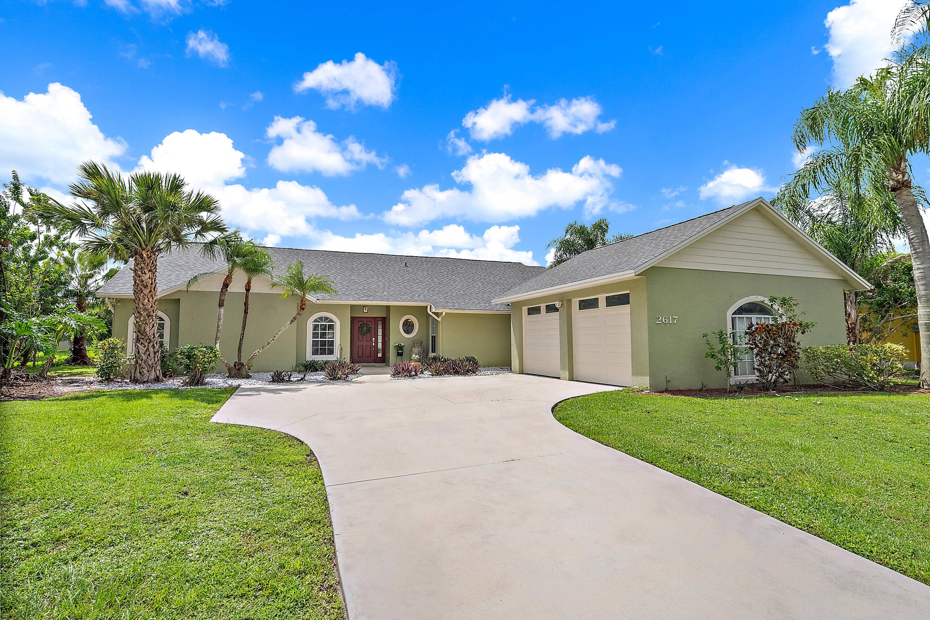 Stunning Waterfront Pool Home in Gated Palm Lake Gardens Enjoy panoramic lake views from this beautifully maintained 4BR 3BA home with a 2020 roof and driveway, 2021 A C, and ...