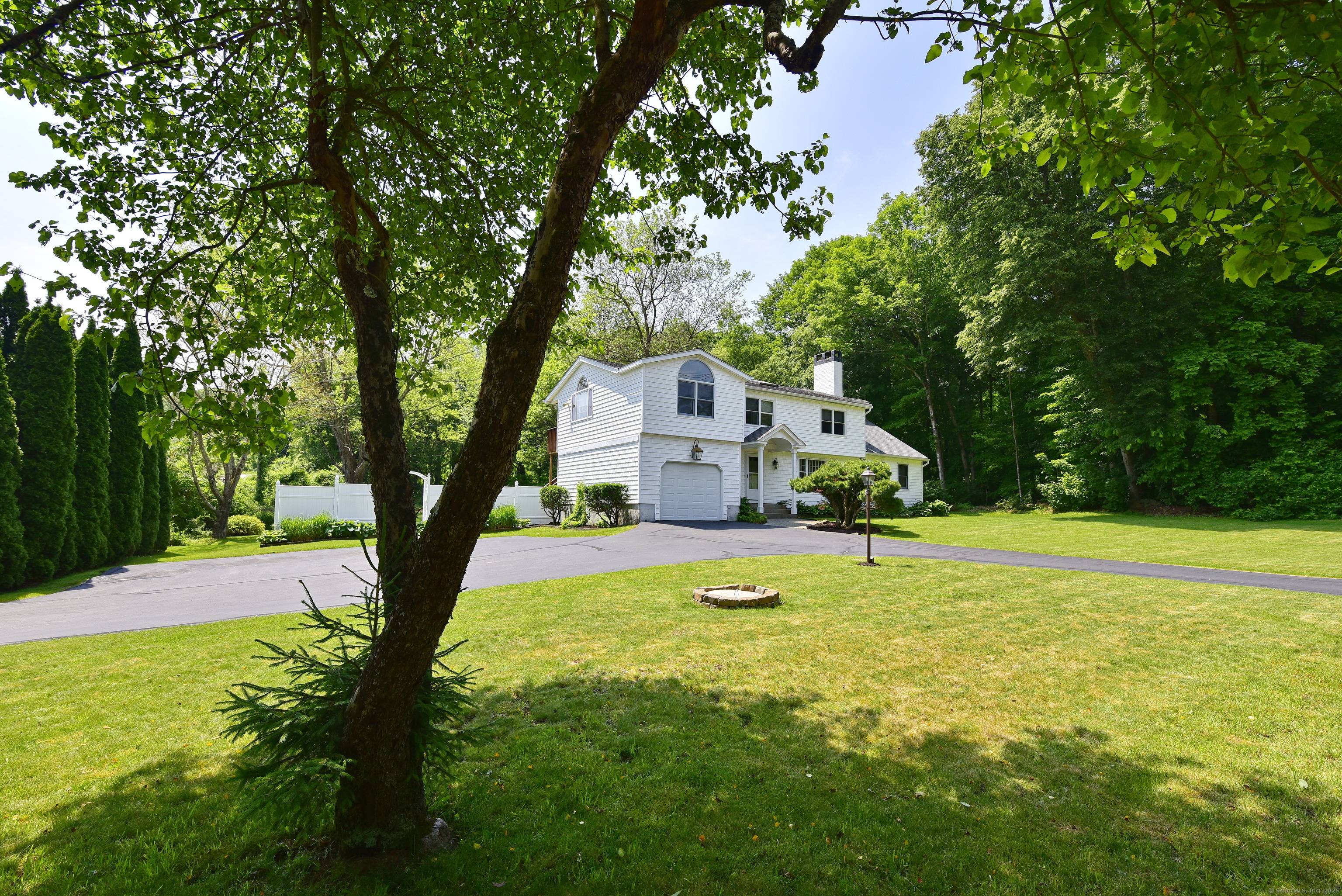 Welcome to this spacious and versatile home in the heart of desirable Pomfret, CT.