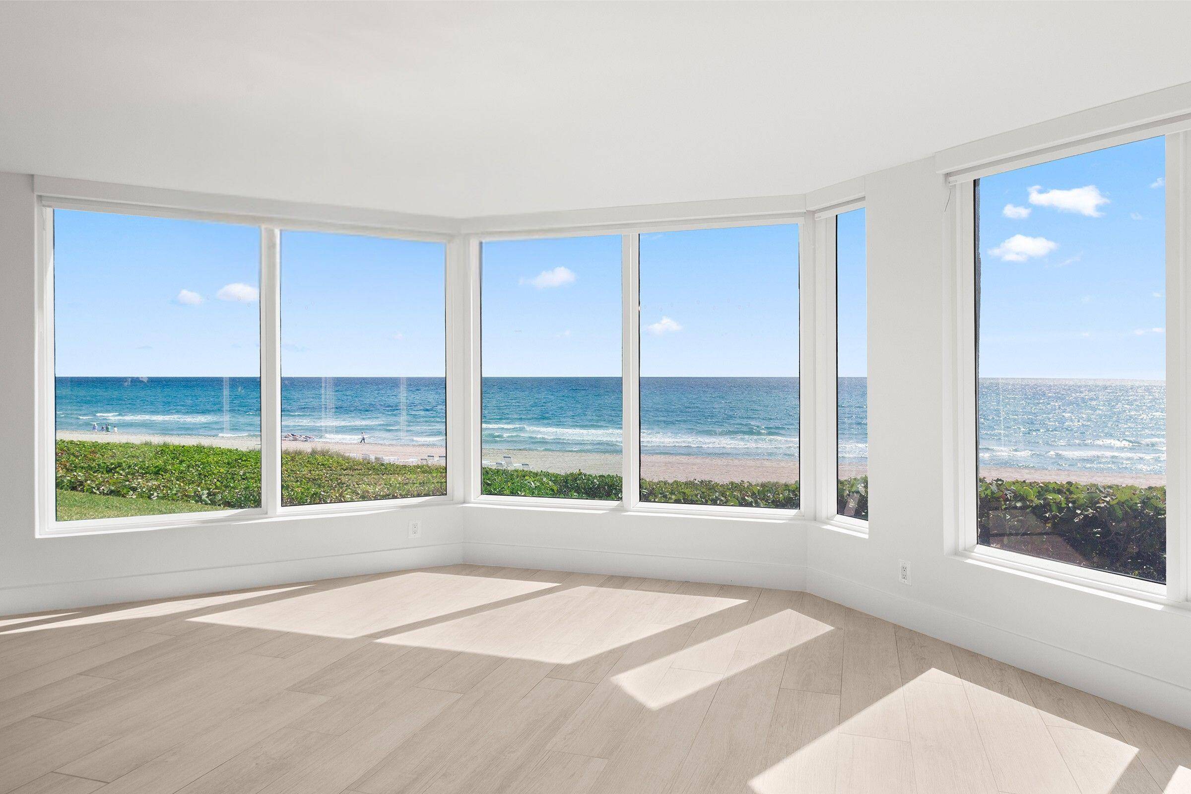 A private beachfront residence with direct access to the sand in the exclusive 36 residence Townhouses of Highland Beach.