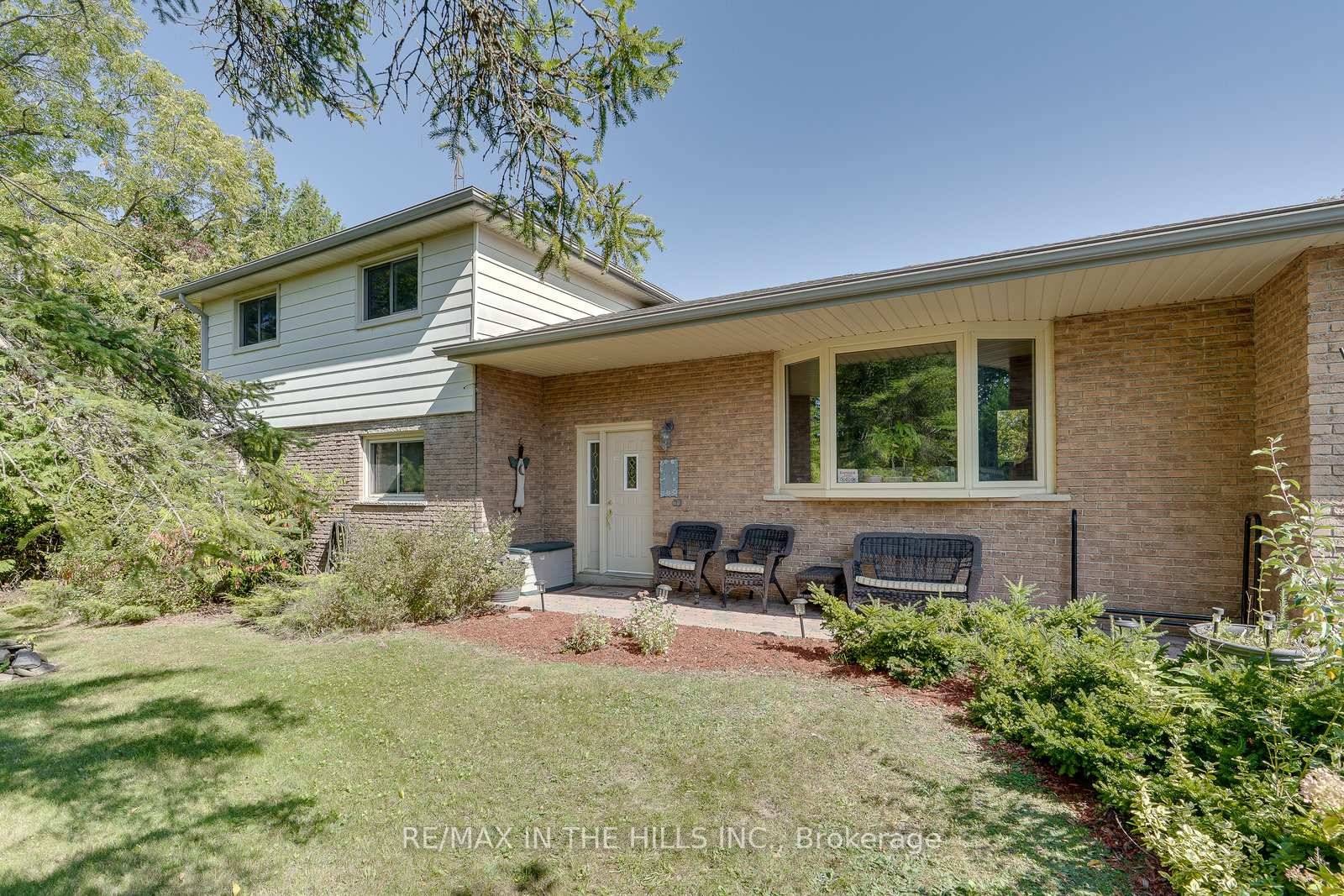 Country Living Meets Spacious Comfort on 2 Private Acres !