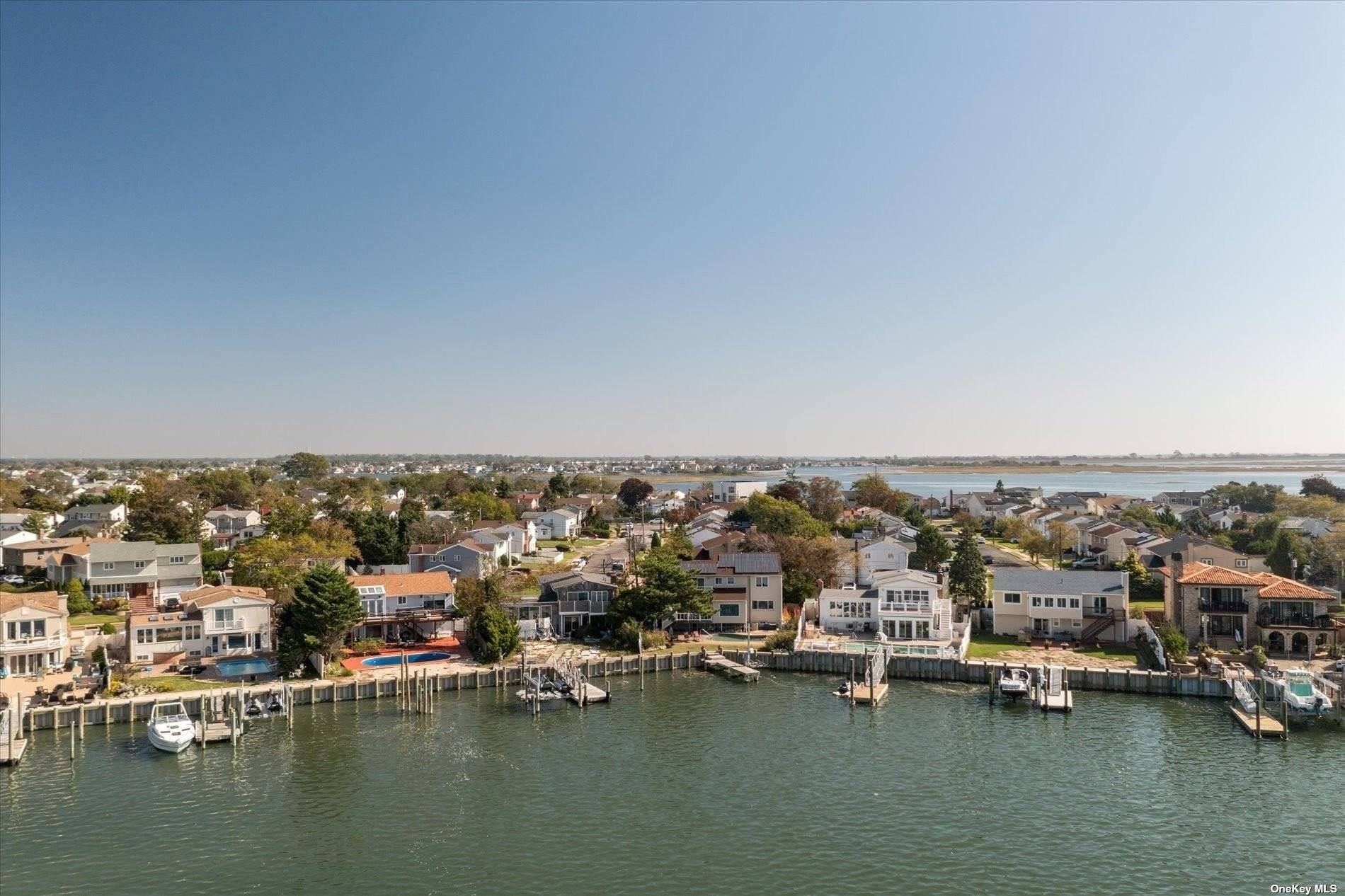 Welcome to 3540 Bertha Drive with it's spectacular open bay waterfront and magnificent sunsets !