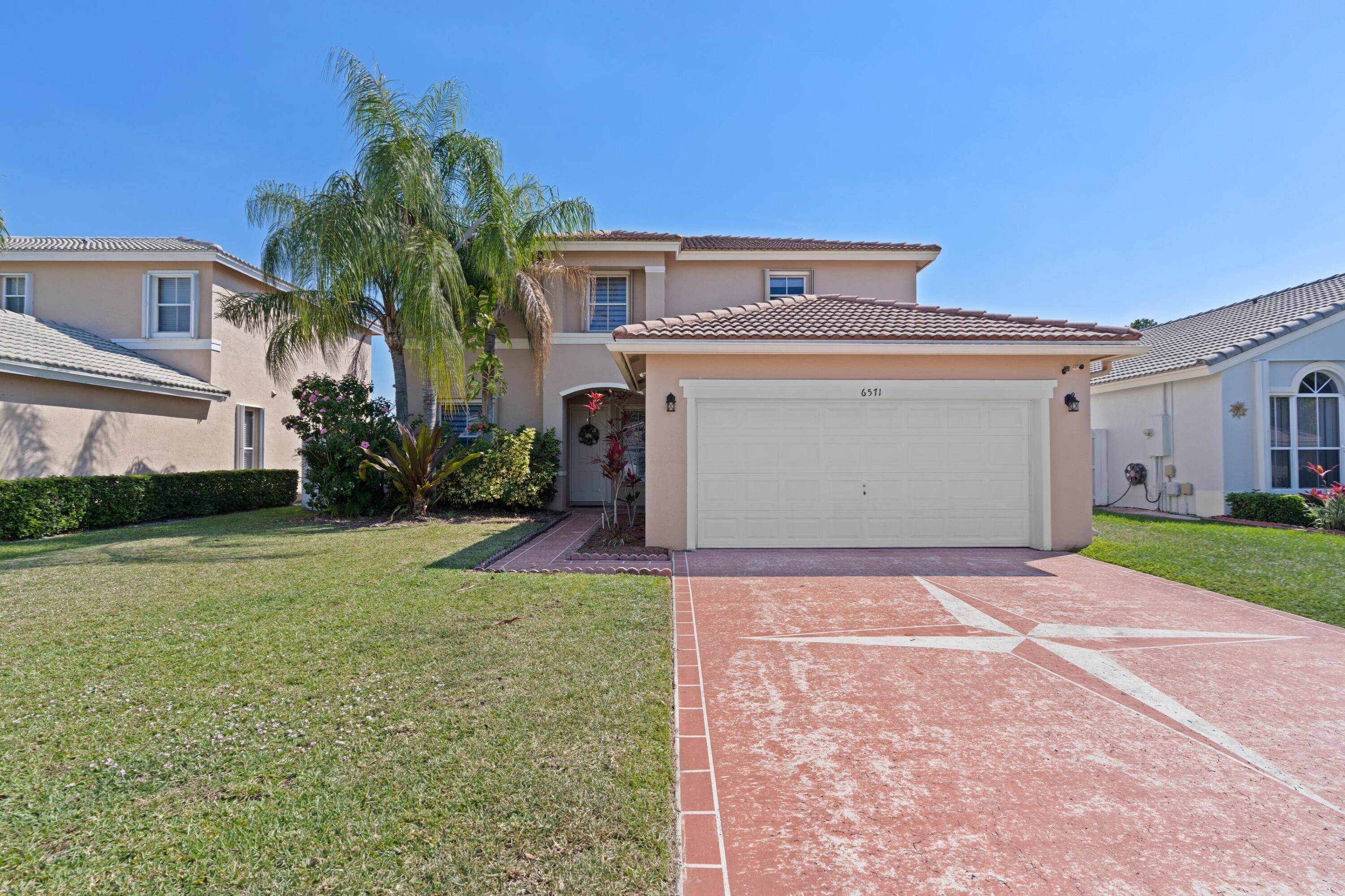 Welcome home to your own tropical paradise with this stunning 5 bedroom, 3 bathroom home.