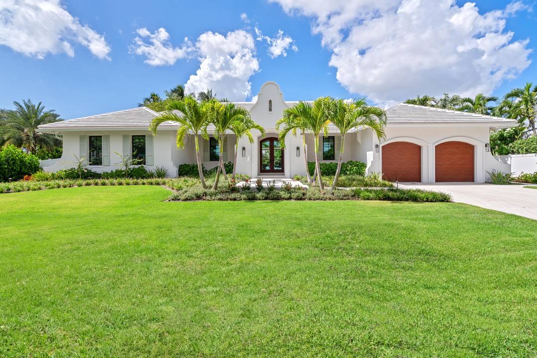 On a prime corner lot in Delray Beach's coveted Lake Ida enclave, this chic 2025 built contemporary residence, designed by Darius Zubrowski, AIA, NCARBArchitect, offers an open floorplan great room, ...