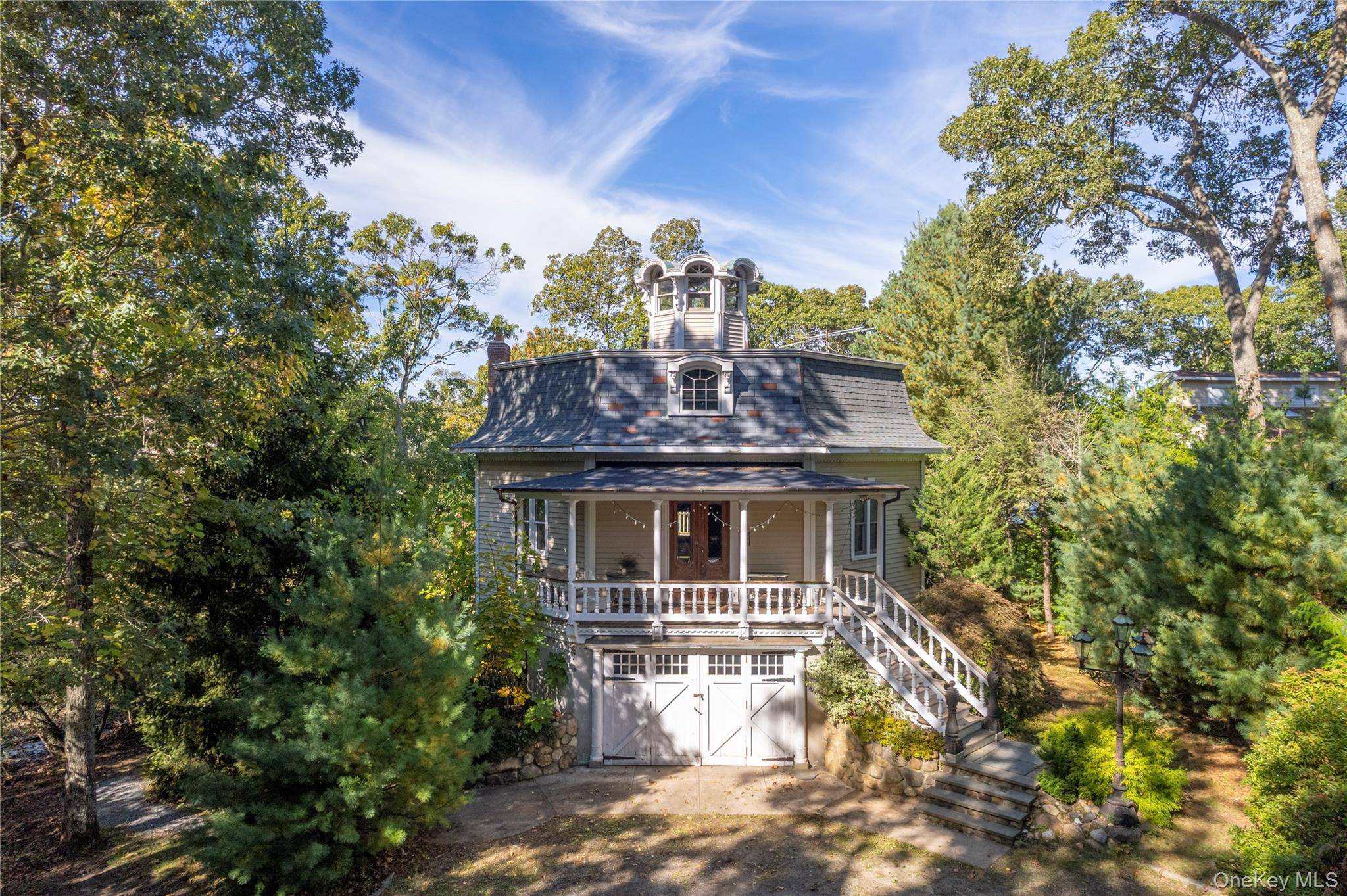 Charming Second Empire Octagon Home on Waterfront Property A Rare Renovation Opportunity Nestled on 1.