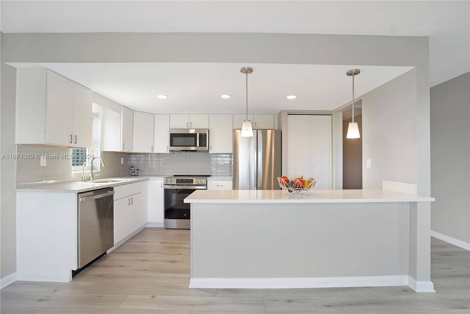 NEW PRICE ! Move into the newly renovated penthouse apartment in the heart of South Beach.