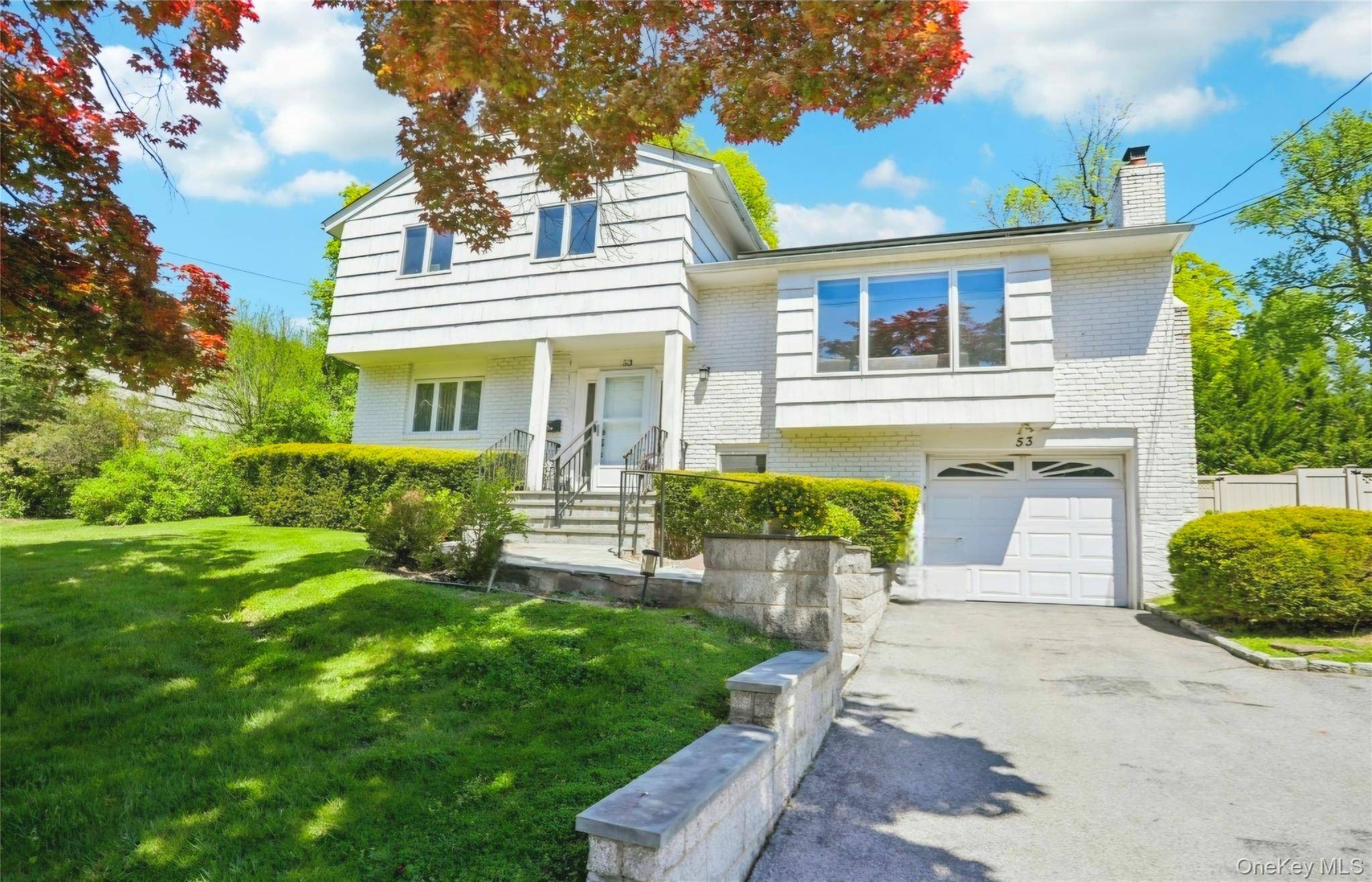 Bright and spacious 4 bedroom, 3 bath split level home with an open layout and plenty of natural light.