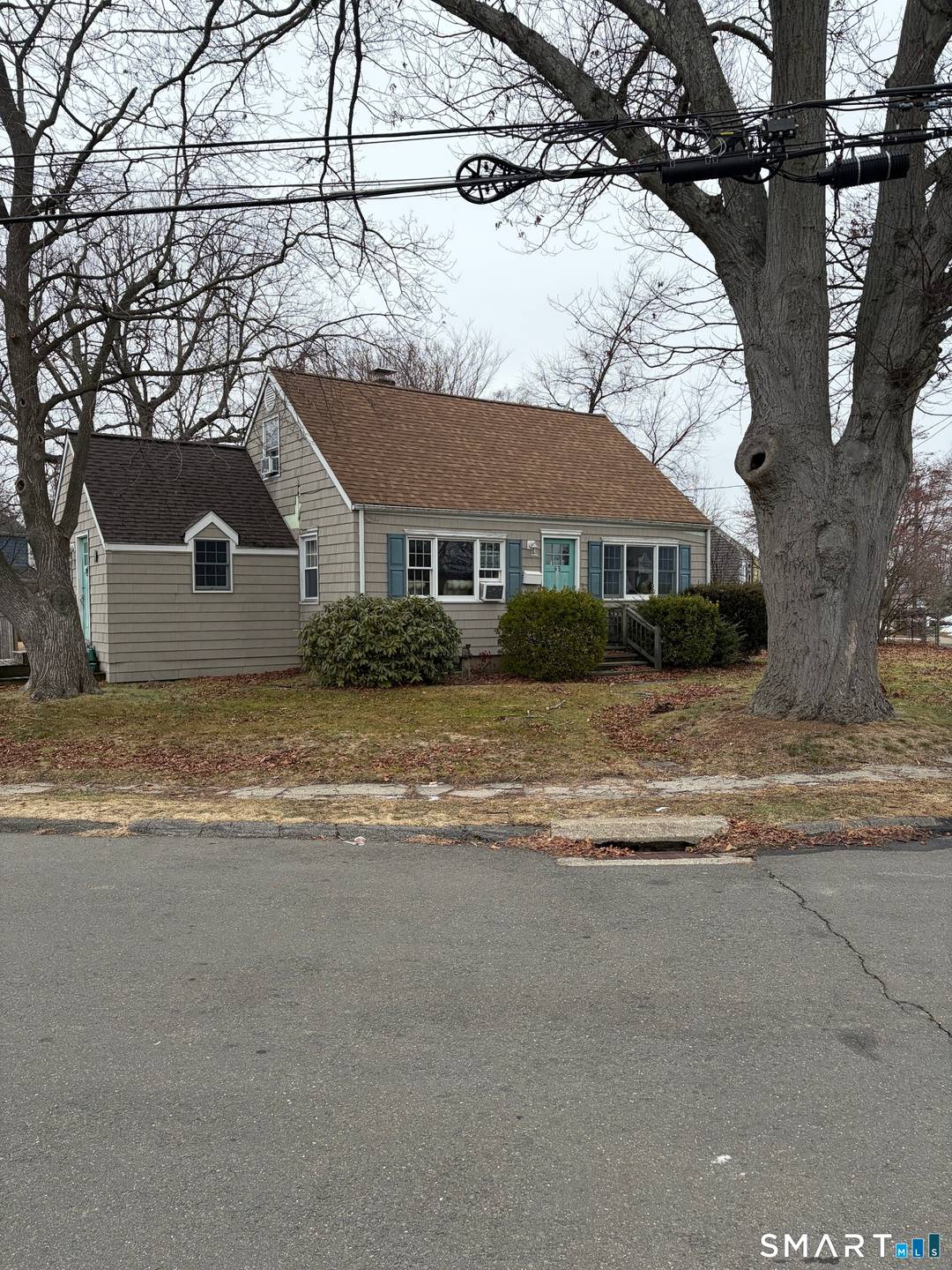 Expanded 2 bedroom 1 bath Cape Cod style home in the Rivercliff area of Milford.