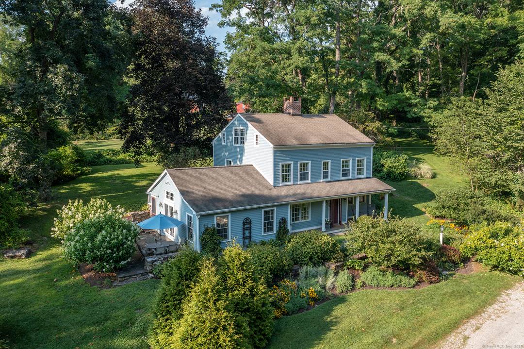 Step into nearly three centuries of New England history with this enchanting 1745 Antique Colonial gracefully positioned on 1 acres straddling the towns of Lakeville and Sharon.