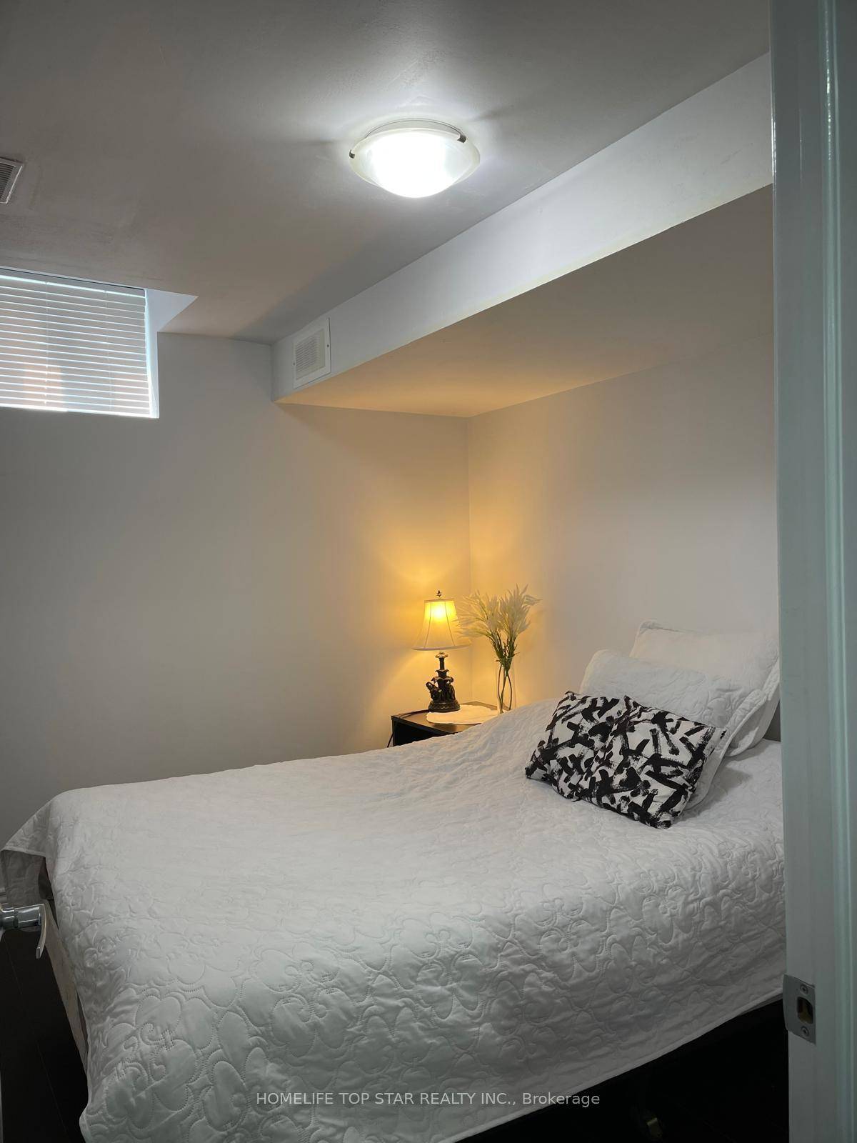 One bedroom basement apartment with a full washroom and a kitchen available for lease.