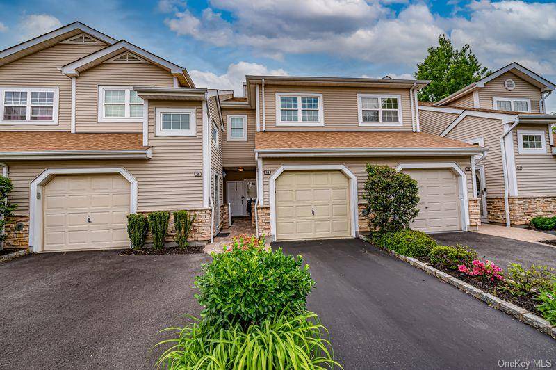 Welcome to this stunning, fully renovated lower level two bedroom condo in the prestigious Hamlet at Olde Oyster Bay.